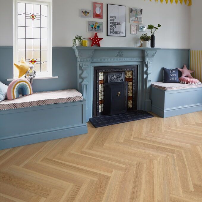 TLC Massimo in English Oak Large Parquet laid in a living room by a fireplace