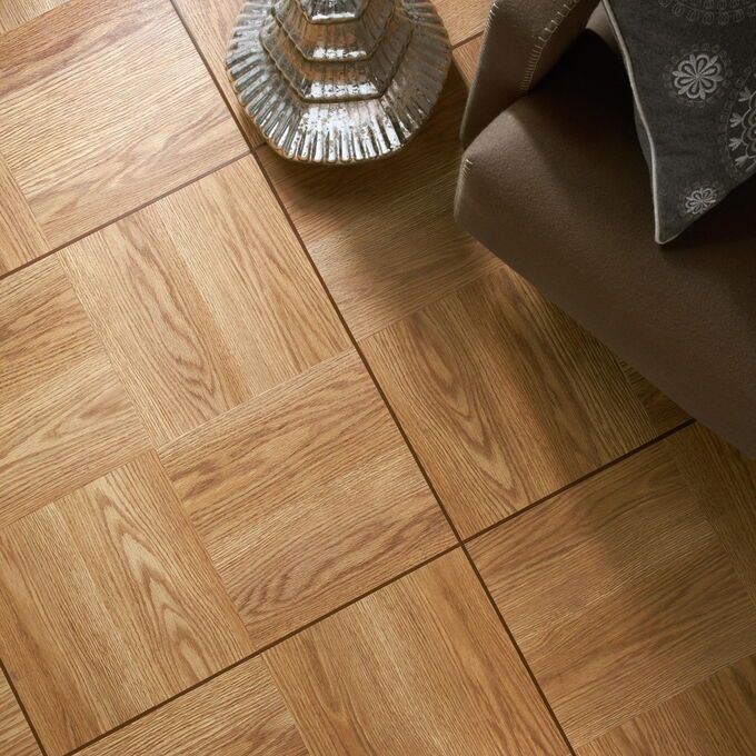 TLC Original in Classic Oak next to an ornament and a chair