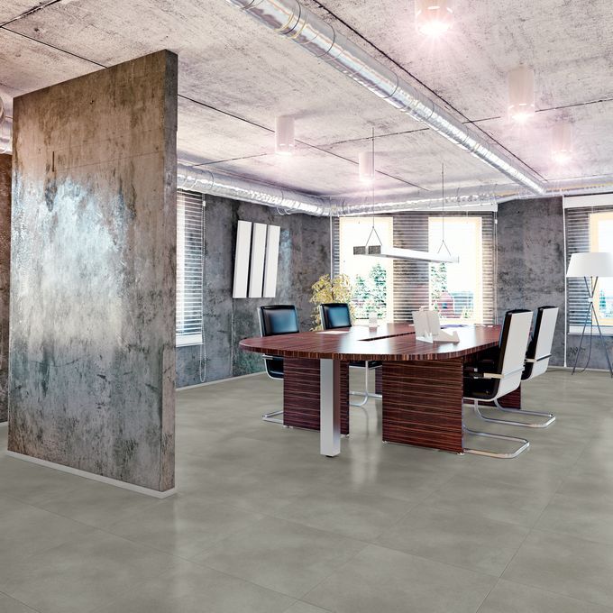 Concrete effect flooring in a modern commercial office space