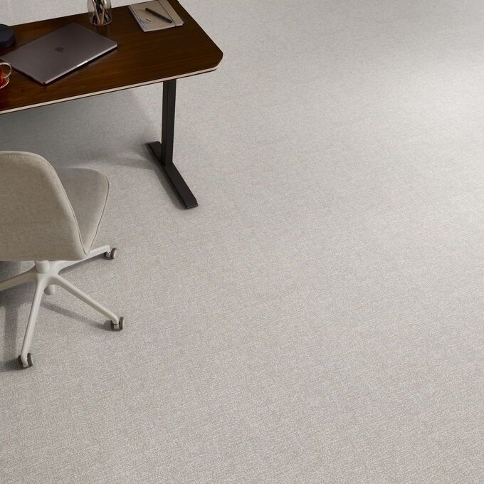 Polyflor Expona Fabrik in Mid Beige laid next to a desk