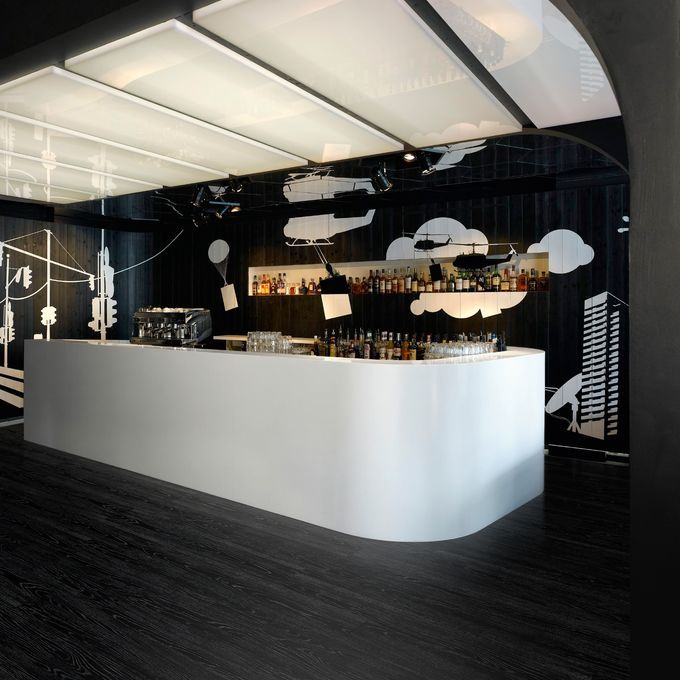 Modern white bar with Jet Black Ash flooring 