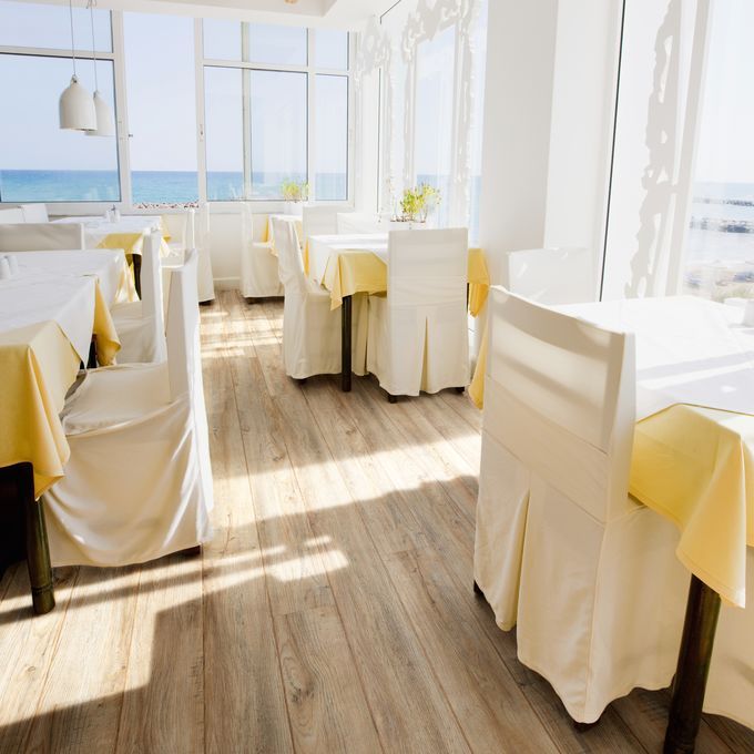 Beach front restaurant with sea views and rustic effect flooring 