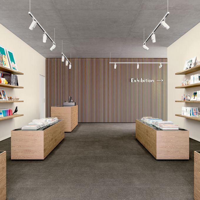 Dark coloured flooring laid in a retail book store