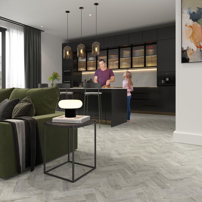 Oak effect parquet flooring laid in an open plan living/ dining space 