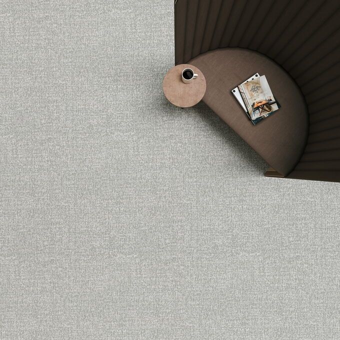 Polyflor Expona Fabrik in light grey with a brown chair and table 