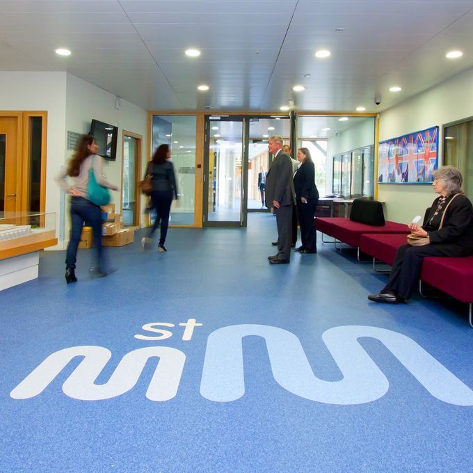 Blue flooring in a school reception area