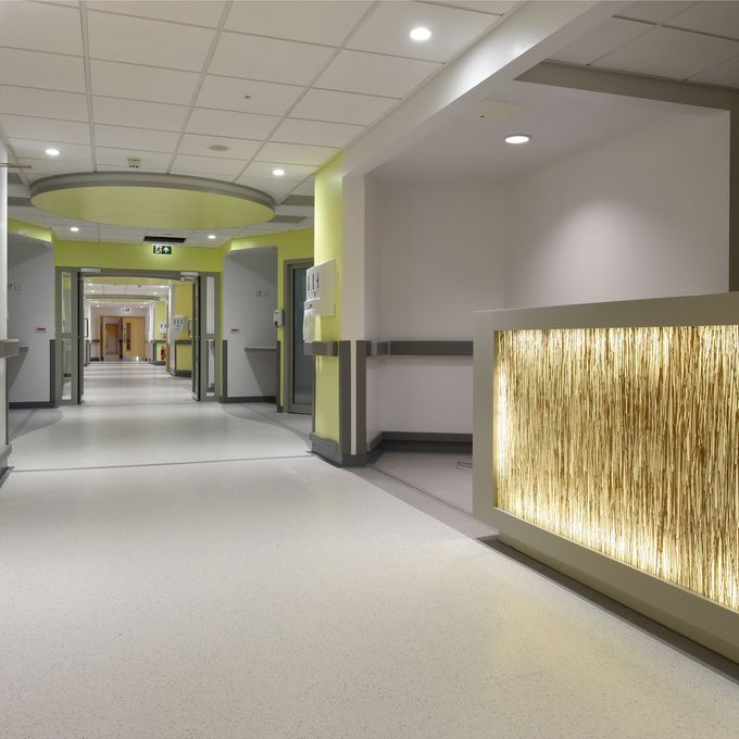 Hospital corridor with light coloured flooring