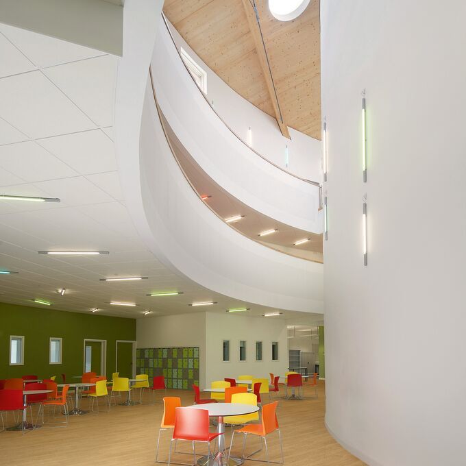 Light coloured oak effect flooring in a public dining area
