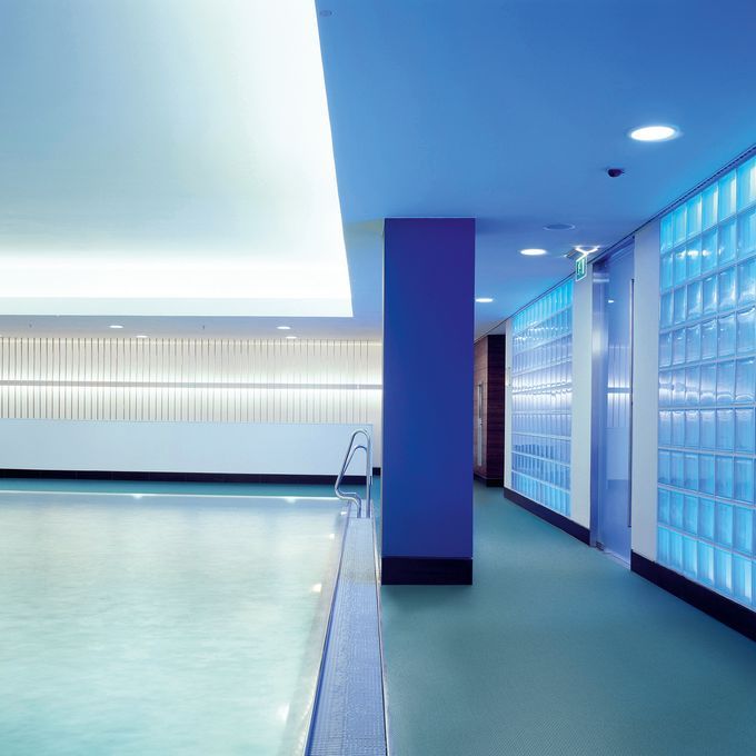 Dark blue colour safety flooring in a Swimming pool area 