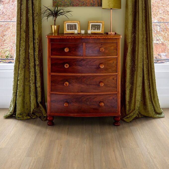 Rustic draws, art, curtains, dark oak flooring 