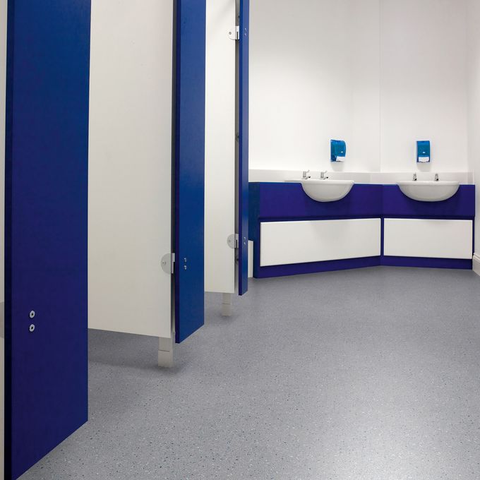 Public toilets with grey flooring
