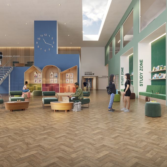 Oak effect parquet flooring laid n a student seating zone with people