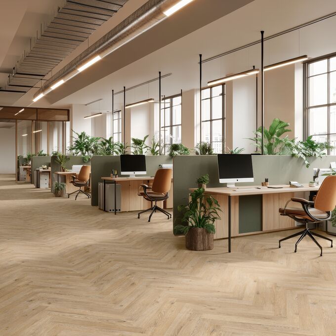Oak effect flooring laid in parquet style within an office department