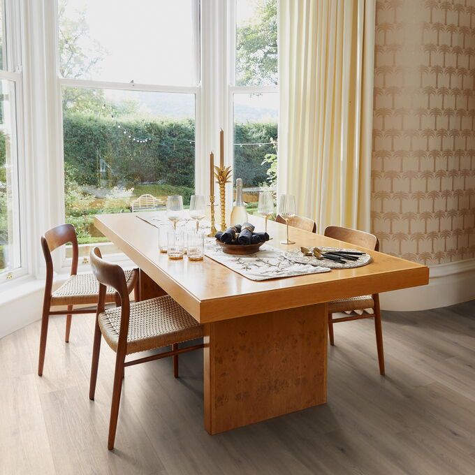 TLC Massimo in Blond Oak laid in a dining room