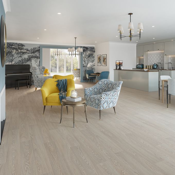 Oak effect flooring laid in a communal kitchen area